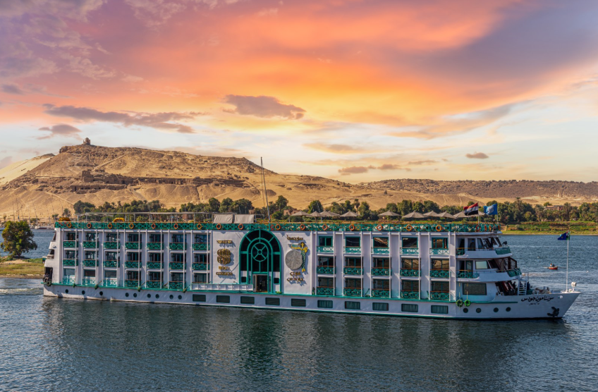 Image of Sonesta Moon Goddess sailing the Nile at sunset, with private balconies and stunning views of Egypt’s landscape.