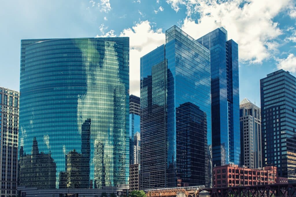 333 West Wacker’s curved glass facade mirrors the bend of the river, an icon of postmodern design along the waterfront.