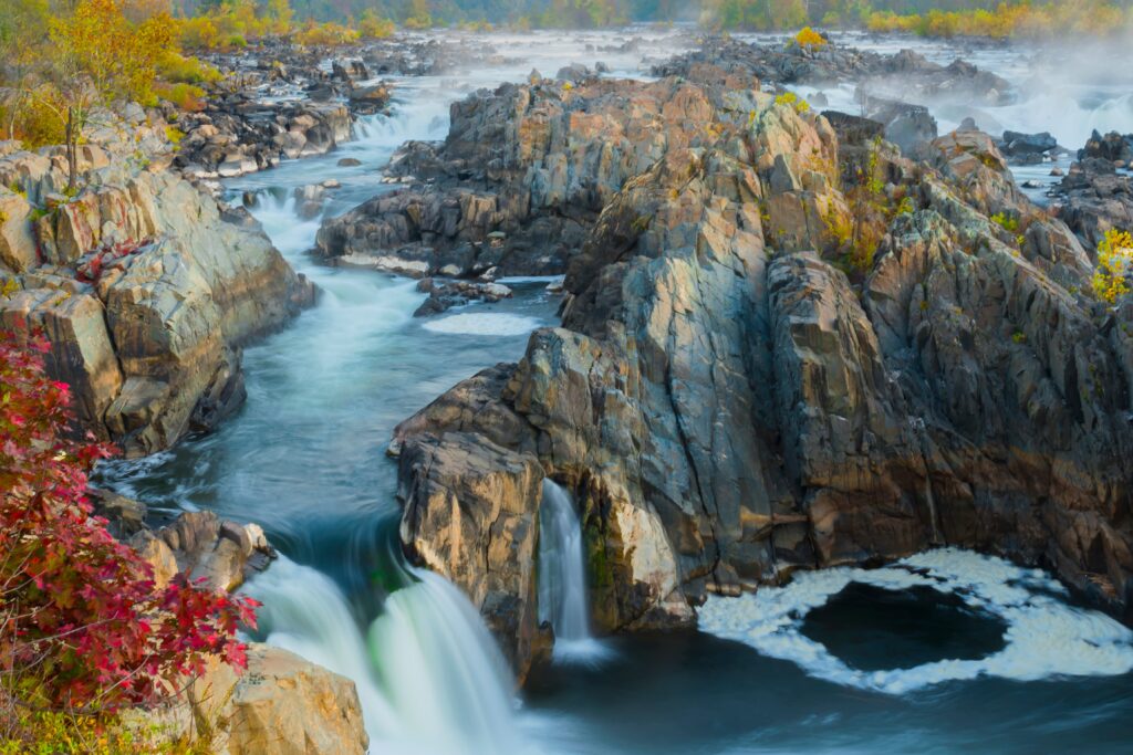 Fall color frames the rugged beauty of Great Falls Park in Northern Virginia.