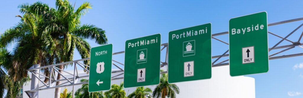 view of highway sign showing Port Miami exits.