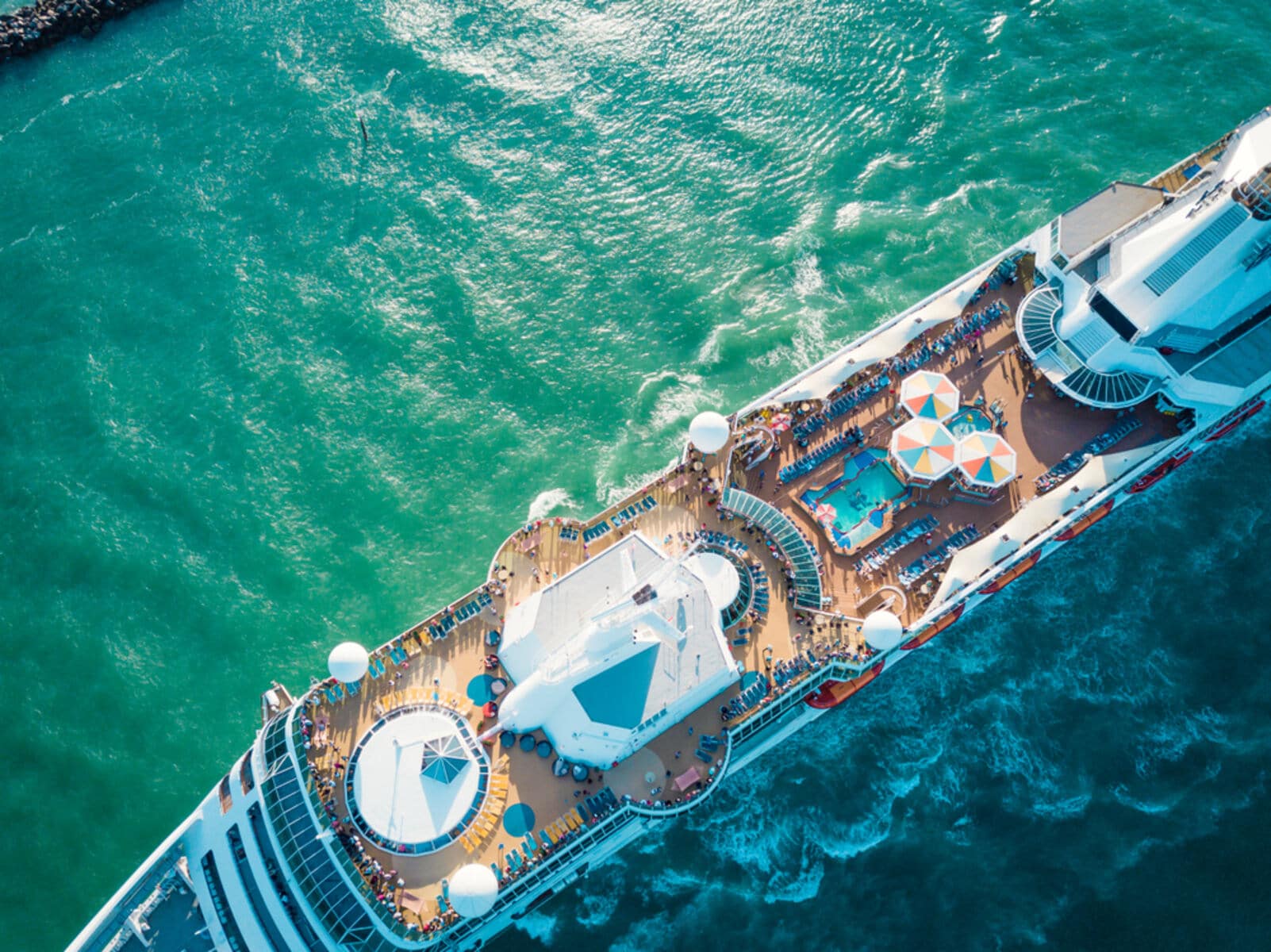 Bird eye view of a cruise ship sailing in the ocean