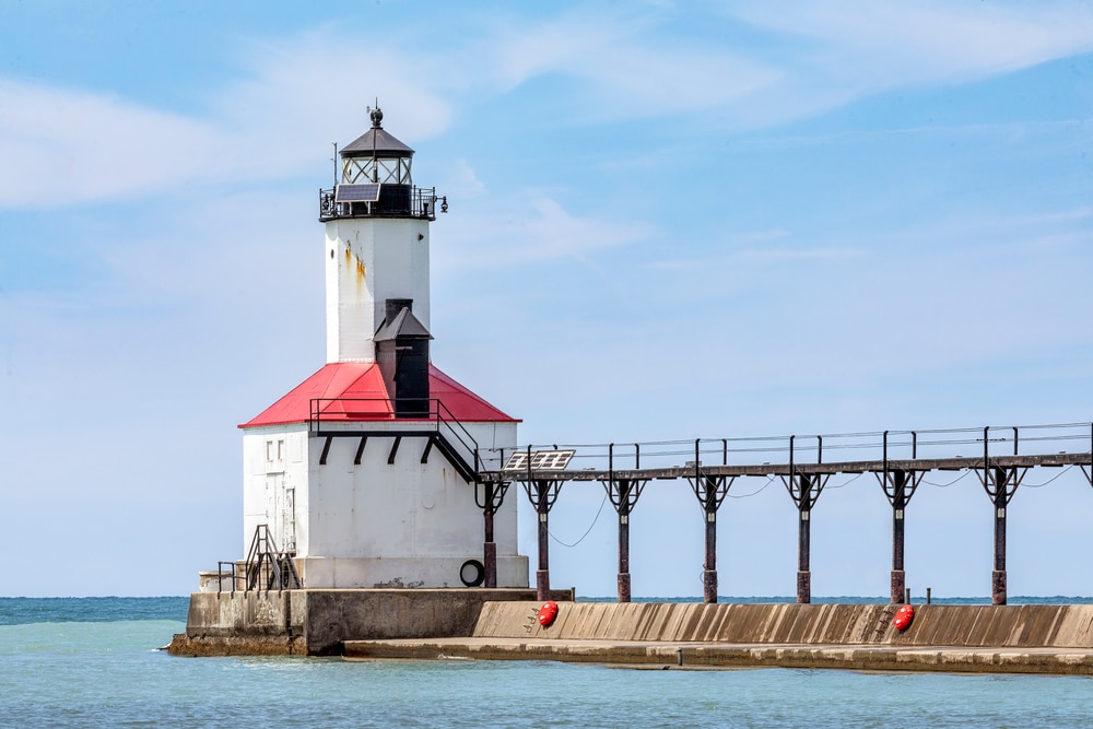A historic lighthouse on Lake Michigan, marks the entrance to the harbor at Michigan City, Indiana