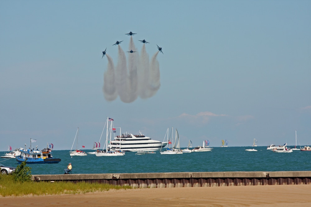 Chicago Air and Water Show, showing jets flying above a sea full of boats.