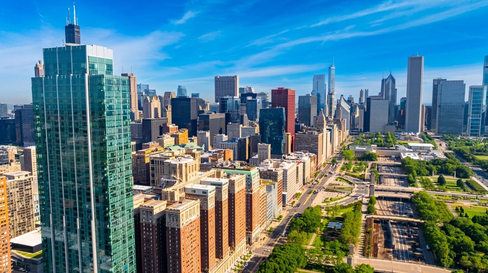 View of the Chicago skyline with view of the Millennium Park on the right side of the frame.