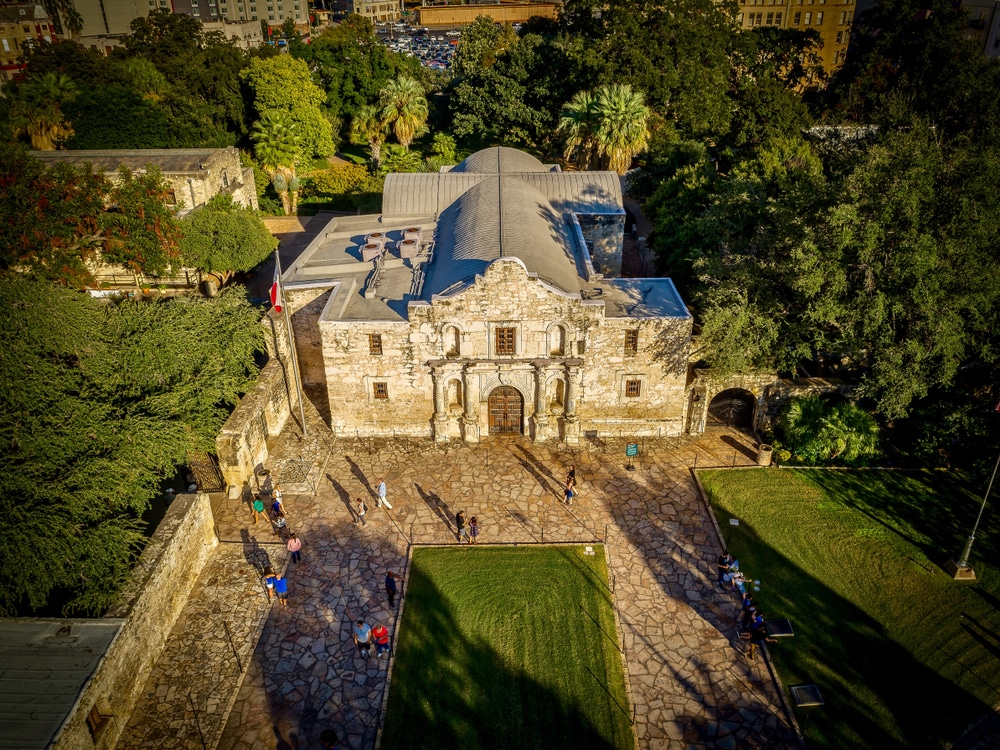 The Alamo in San Antonio, Texas, surrounded by Alamo Plaza, showcasing its historic architecture and cultural significance.