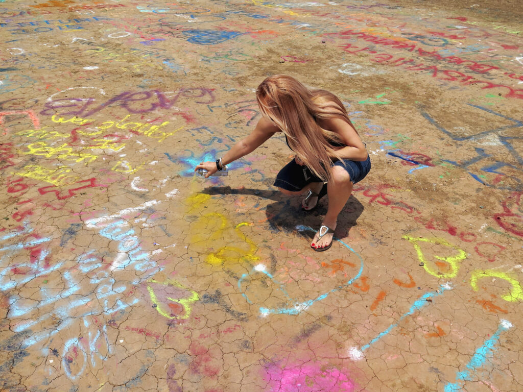 Leave your mark at Cadillac Ranch, Amarillo, TX, and become part of Route 66 lore.
