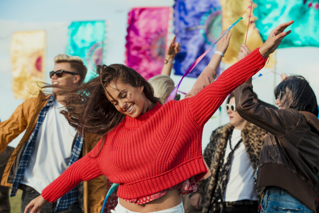 Dancing at the music festival, Coachella Valley, California