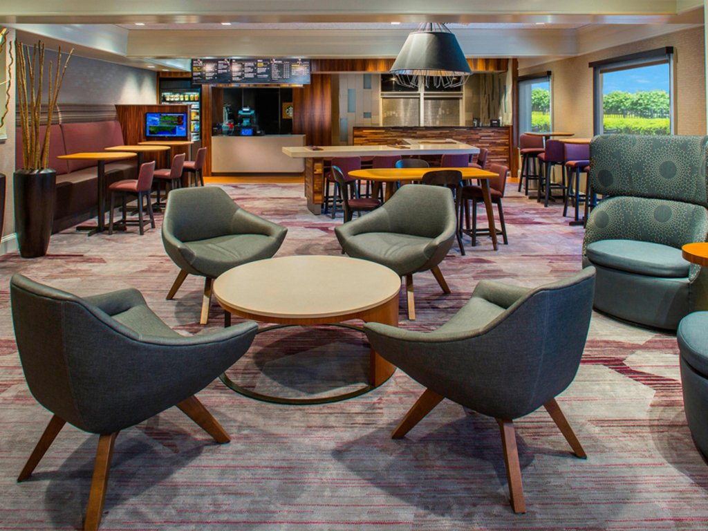 Welcoming lobby area designed with stylish seating and bright lighting.